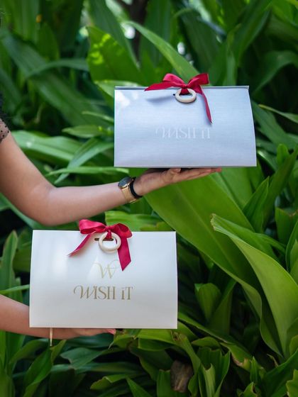 Our "Wishlet Kits" in two classic colors, a soft grey and a clean white. These customizable hampers are designed to fit any occasion and theme.