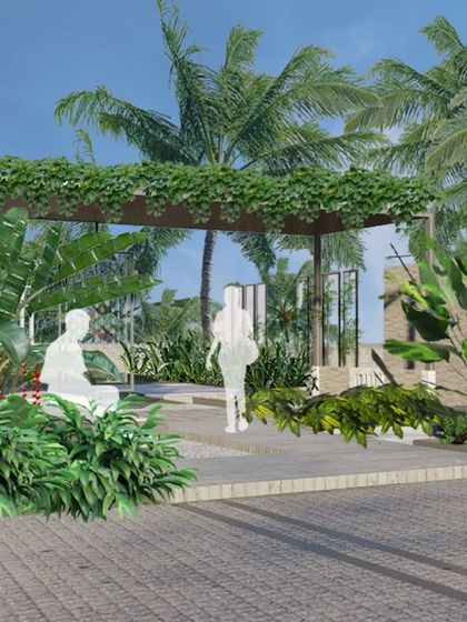 Wedding venues need a grand entrance. For this project in Kasargod, a cobblestone driveway and a large gabion wall create a sense of luxury and arrival, with a pergola-shaded seating area for guests.