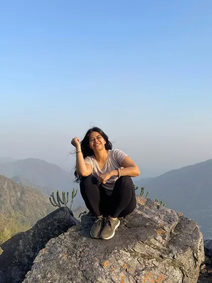 Another happy moment from a mountain hike. The feeling of reaching a peak and taking in the vastness is both humbling and empowering.