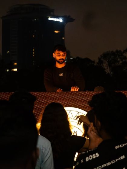 A wider shot of my setup against the city skyline. This shows the professional and atmospheric setting of my rooftop gigs.