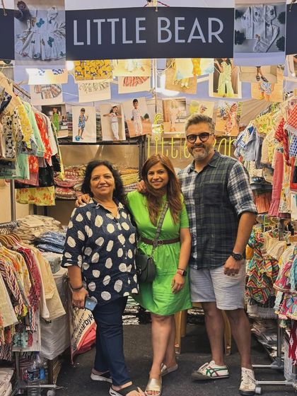 This picture captures the heart of my brand: my family. My mother and my husband are my biggest supporters, and their strength is what allows me to pour my heart into every piece I create.