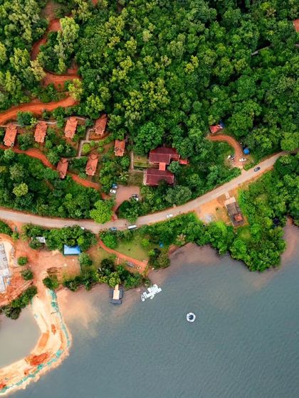 An aerial view of the Sharavati Nature Camp, a perfect base for both adventure and macro photography.