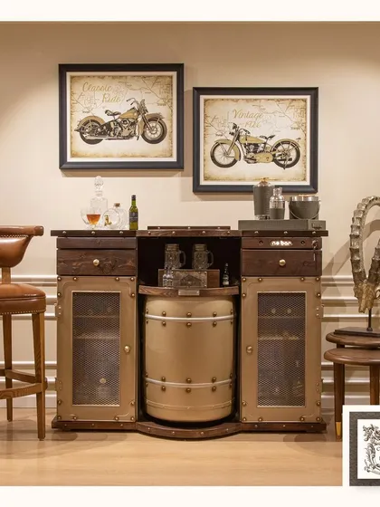 The Barn automated bar in its closed form. This unit presents a rustic-industrial aesthetic with its combination of distressed wood and riveted metal, discreetly hiding its true function.
