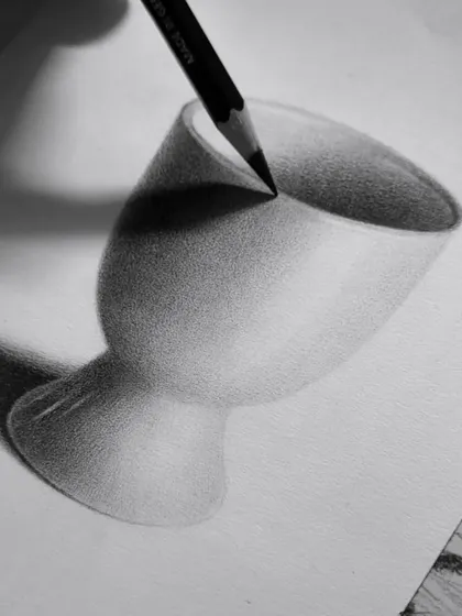A different angle of the ceramic cup study, emphasizing the deep shadow inside the cup to create a sense of volume.