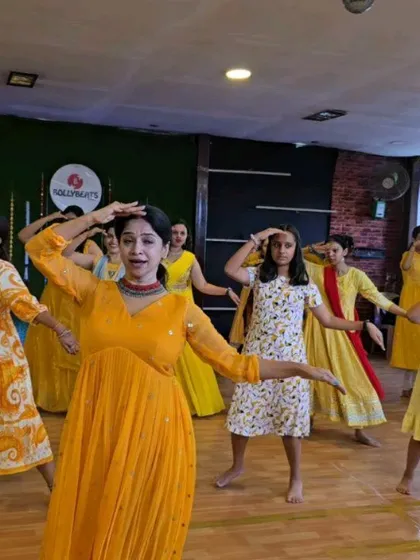 An action shot from the Bangalore workshop, capturing the grace and energy of the participants. Everyone is completely lost in the music and the movement, which is what BollyBeats is all about.