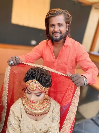 Posing with a bride after completing her look. I take pride in making sure every bride feels confident and beautiful, with a hairstyle and makeup that enhances her natural features.