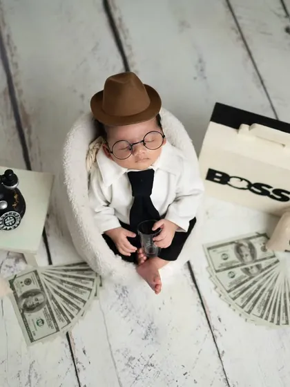 Even the tiniest clients can have big personalities. This "Boss Baby" theme is a fun and creative way to capture your newborn, complete with a tiny suit, briefcase, and a bit of attitude.