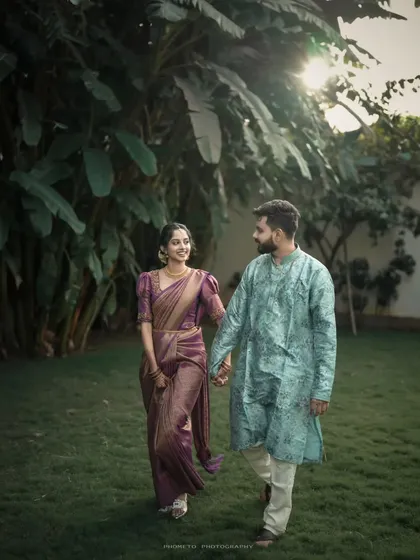 A quiet walk together in a beautiful garden setting. This engagement photo captures the peaceful and romantic side of their relationship.