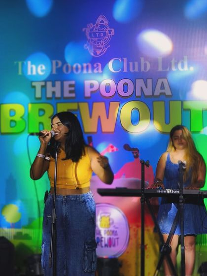 Another angle from the Brewout, featuring my talented keyboardist. A great band is key to a great performance, and I'm proud to share the stage with amazing musicians.