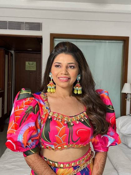 Playful Mehendi & Haldi Hair photo 60