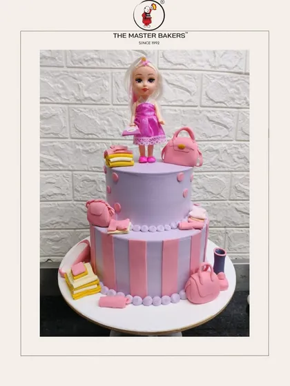 This two-tiered Barbie-themed cake is all about style and fun. Decorated in pink and lavender with edible miniature bags and accessories, it's perfect for a little fashionista's birthday party.