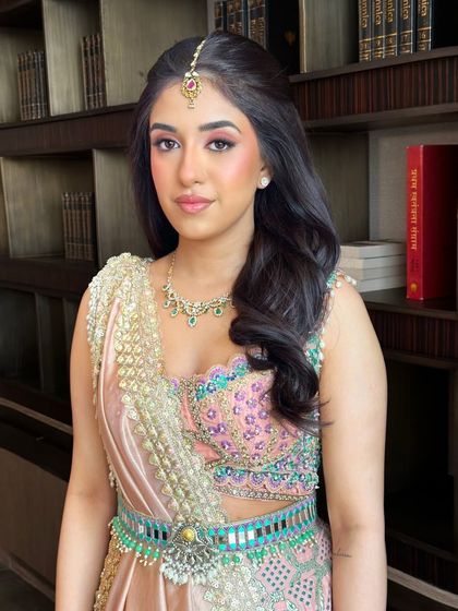 The magic of fresh morning glam in soft pastel hues. This look is light, radiant, and effortlessly elegant, perfect for a dreamy start to a Mehendi or Roka ceremony.