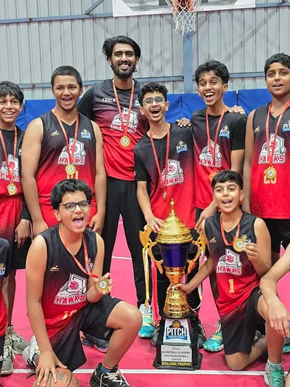 The ultimate goal. Here are our Pitch Hawks, champions of the Youth League Season 2, celebrating their hard-earned victory with the championship trophy.
