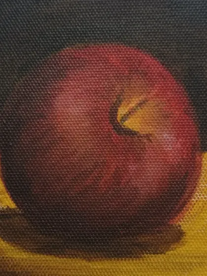 An acrylic painting of a red apple. By placing the apple against a dark background, we learn how to make the colours appear more vibrant and create a dramatic effect.