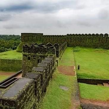 The moss-covered walls of Mirjan Fort, a historic fort near Gokarna that we explore on our coastal heritage trips.