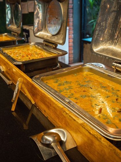 A spread of hot, delicious curries ready to be served. I make sure there's plenty of variety in my buffet.