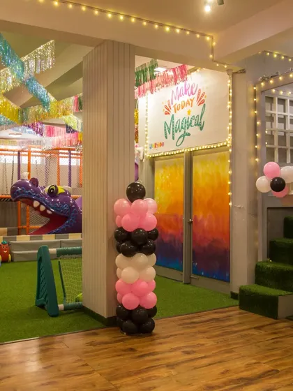 A glimpse into our magical world! Our play area is designed to be open, vibrant, and full of exciting corners to explore, from the soft play structures to the mini soccer field.