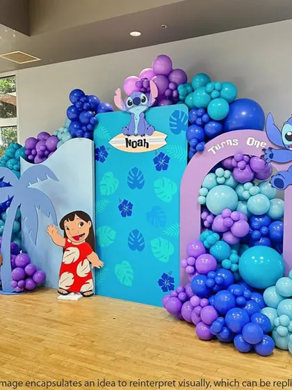 This Lilo & Stitch first birthday party features multiple backdrops and character cutouts, creating a layered and immersive tropical scene.