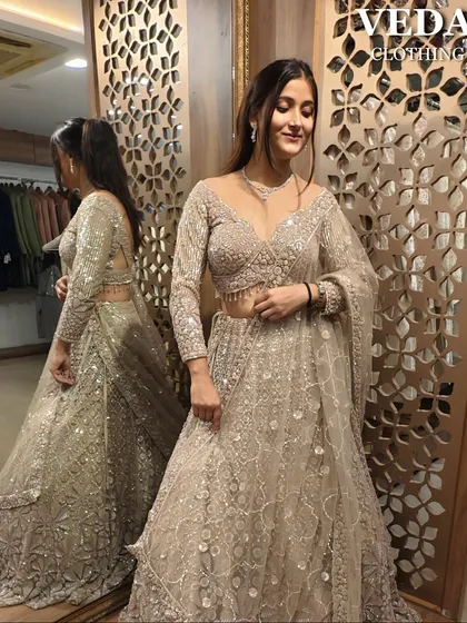 A candid moment in this beautiful beige lehenga. It’s comfortable enough to move and dance in all night.