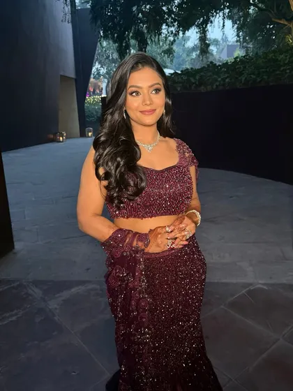 Himanshi's Roka look from another angle, capturing her joyful smile and the beautiful details of her makeup and outfit.