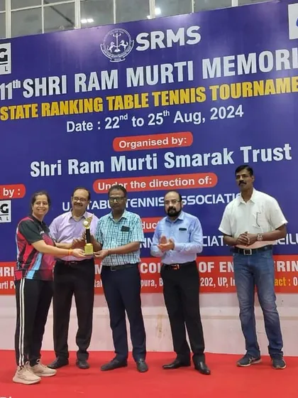 Mradula Pastor receiving her Silver medal trophy at the UP State 2nd Table Tennis Ranking in Bareilly.