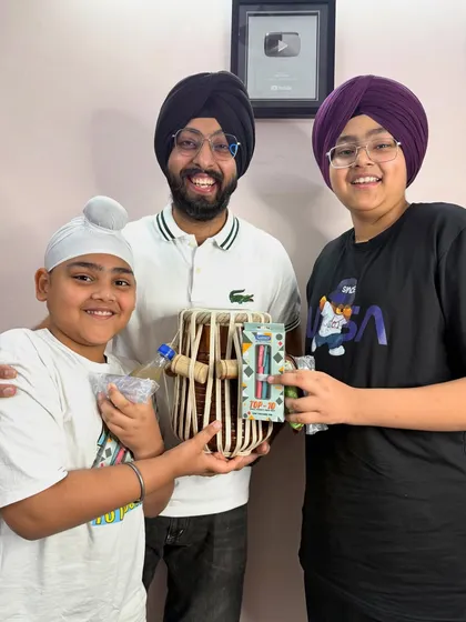 The joy of learning and growing together at the Tablagram academy. Rewarding these two talented brothers for their hard work during our student meetup.