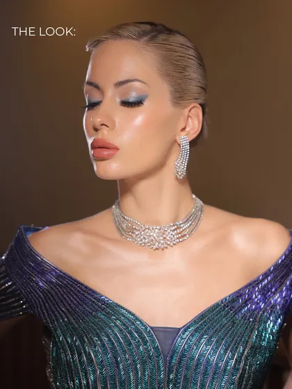 The final look: statement shimmer eyes, velvet lips, and a glass-skin glow. This is pure drama, perfect for a bride who wants to be unforgettable.