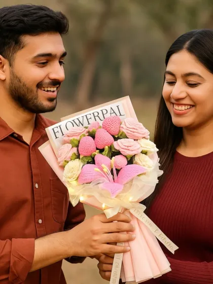 A gift that speaks volumes. This beautiful pink bouquet, featuring a mix of roses, tulips, and a lily, even has subtle LED lights to add a magical glow.