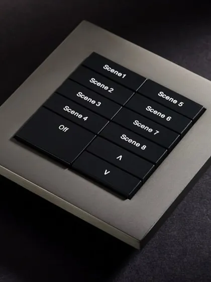 A detailed look at a Rako EOS keypad with a custom button layout for controlling eight different pre-programmed scenes. This level of customization allows for precise control over complex lighting and shading setups.
