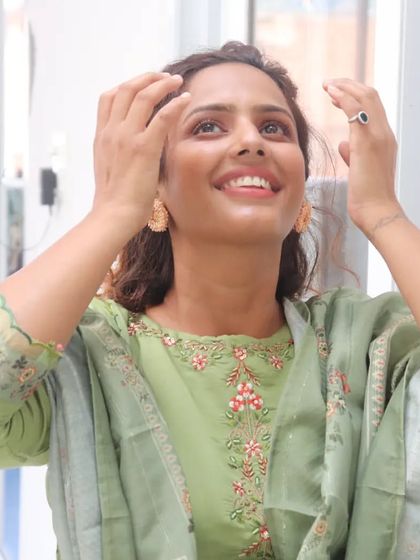 A candid moment in my light green suit. The best outfits are the ones that make you feel happy and carefree.