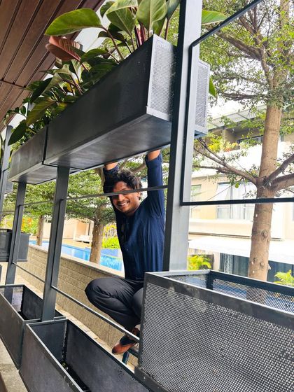 Monu, hanging around on the job! It's not all serious work; we have our fun moments too. It's this positive energy that we bring to every project.