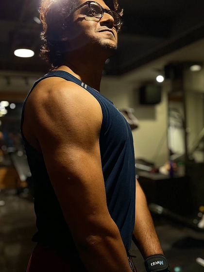 This client is on day five of his lean bulking program, focusing on shoulder development. You can already see the muscle definition and progress from our dedicated training sessions.