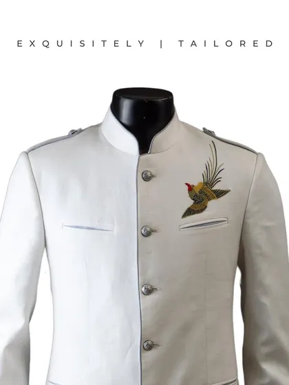 This two-tone bandhgala with a single embroidered bird on the pocket is a playful yet elegant piece. It’s for the man who enjoys a touch of retro class in his wardrobe.