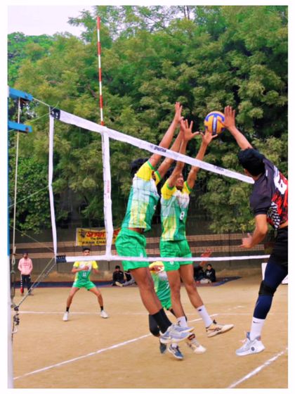An action shot from the Senior State Championship in Delhi. Our players executing a powerful block at the net, a skill we drill relentlessly in our advanced coaching camps.