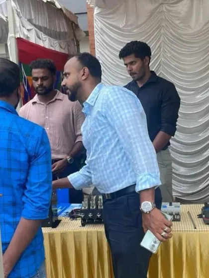 A candid shot of a detailed product explanation at the KETA Energy Conclave in Kerala.