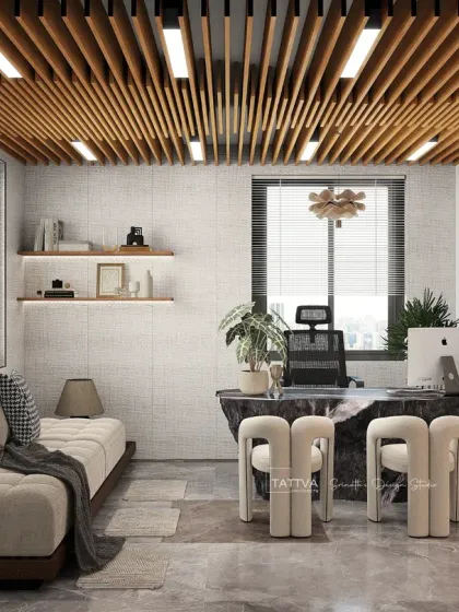 A view of another office cabin in the same project, showcasing a chaise lounge for relaxation and a clean, professional aesthetic.