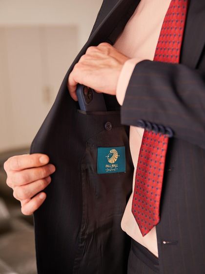 A look inside the jacket reveals the quality of the lining and a discreet internal pocket, perfectly sized for a modern smartphone. Functionality is seamlessly integrated into my designs.