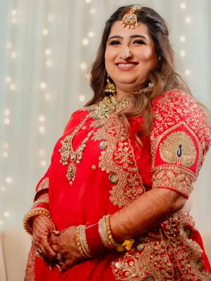 A collection of moments from this bride's reception. Her look was all about soft glam, with flowing waves and makeup that highlighted her joyful smile, creating a perfect look for her evening celebration.