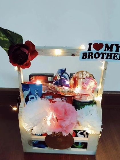 Another view of my light-up Rakhi hamper, this gift basket is perfect for an evening celebration. The warm lights highlight the selection of treats inside, creating a beautiful and heartfelt gift for your brother.