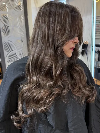 A side view of the smokey ash babylights, showing how they frame the face and add dimension. This is a look that is both trendy and timeless.