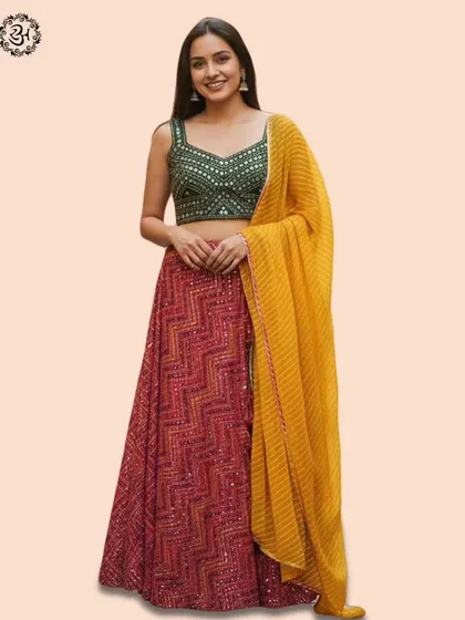 This stunning red and green lehenga is perfect for making a statement. The model wears it with a contrasting yellow striped dupatta, showcasing how you can mix and match pieces for a unique look.