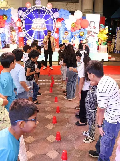 Our energetic anchor leads a fun group game, keeping the kids engaged and entertained. Interactive games are a key part of making a party memorable.