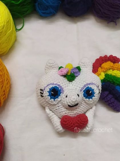 My Valentine's special unicorn heart. It features a rainbow mane and holds a little red heart, making it the perfect gift for your special someone.