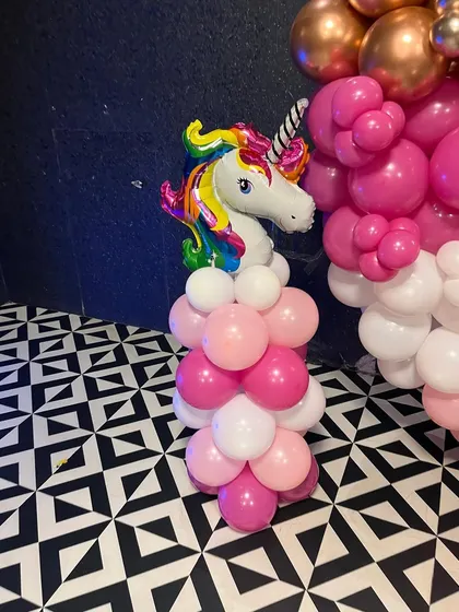 A close-up of the unicorn foil balloon pillar. These small details add a lot of character to themed birthday parties.