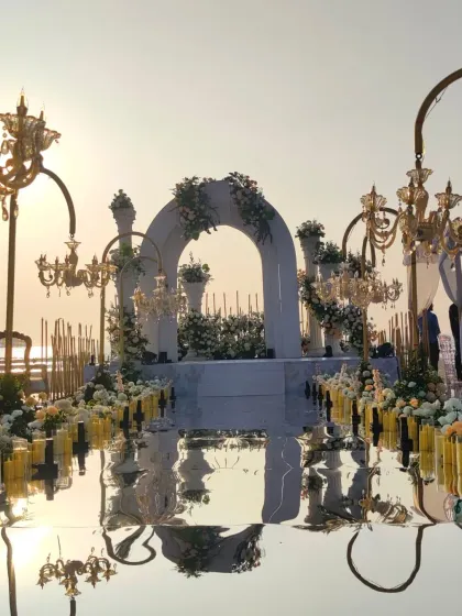 The stunning beachside mandap setup for Keerthy Suresh's wedding. This was our inspiration for the background of their live painting.
