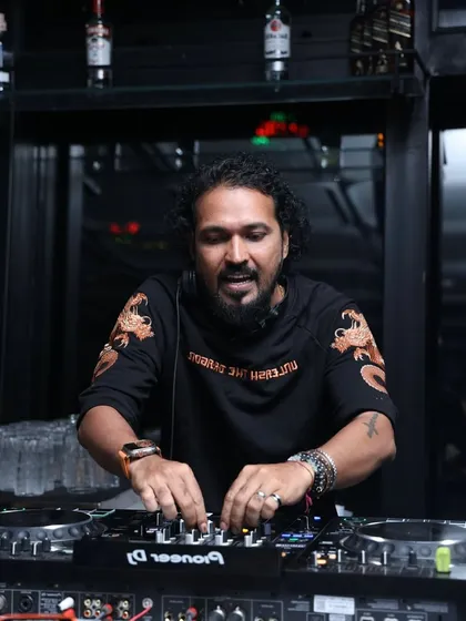 In my element during a New Year's Eve set in Thane. I am focused on the mix, lining up the perfect track to welcome the new year with a bang.