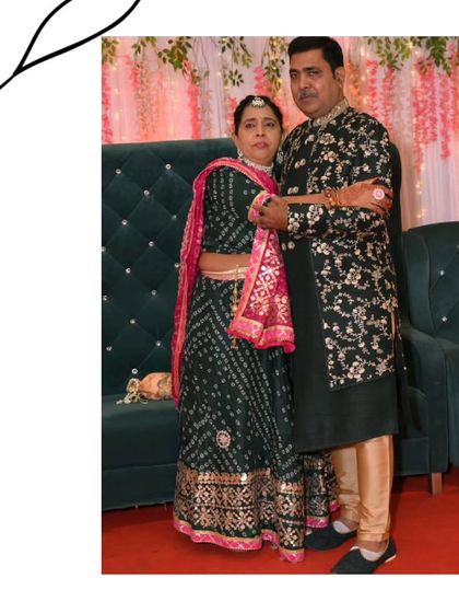 For a more traditional function, this couple chose a classic look. He is in a black embroidered sherwani, and she is in a beautiful green bandhani lehenga.