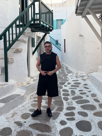 A full-length view of my all-black Mykonos ensemble, showcasing the long shorts and sleeveless top combination.