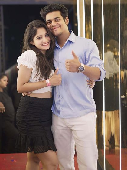 A happy couple posing for a photo.