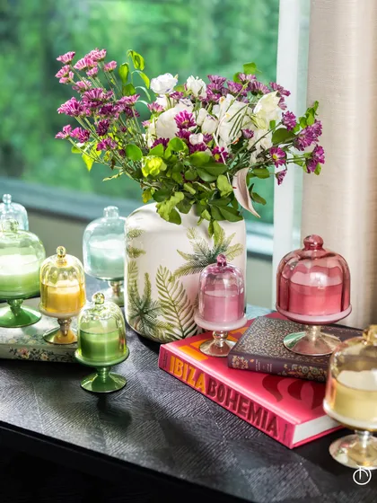 Bask in the Sundance Aura. These intricately designed, hand-poured fragrances in footed bell jars make a perfect gift for the ones who matter most, adding a pop of color and a beautiful scent to their home.